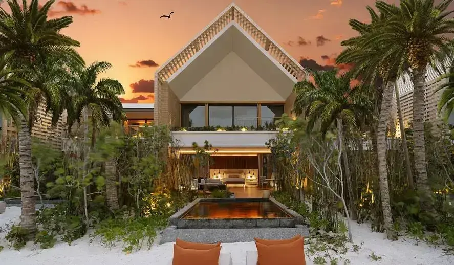 btmxmy-beachfront-pool-suite-sunbeds-dusk-exterior-920-518-1